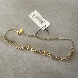 Coach Gold Script Necklace